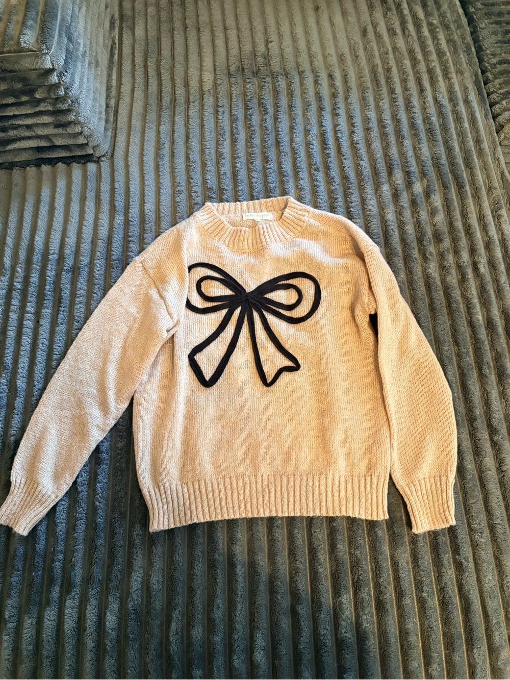 Belle Du Jour Cream Crewneck Sweater with Black Bow